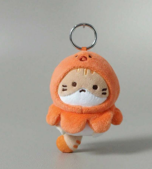 Mikan Cat mini plush keychain in an orange costume